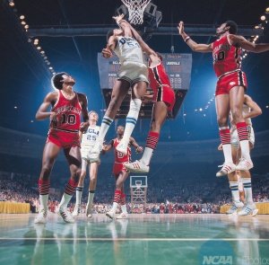 UCLA forward Marques Johnson (54) and Louisville center William Bunton 